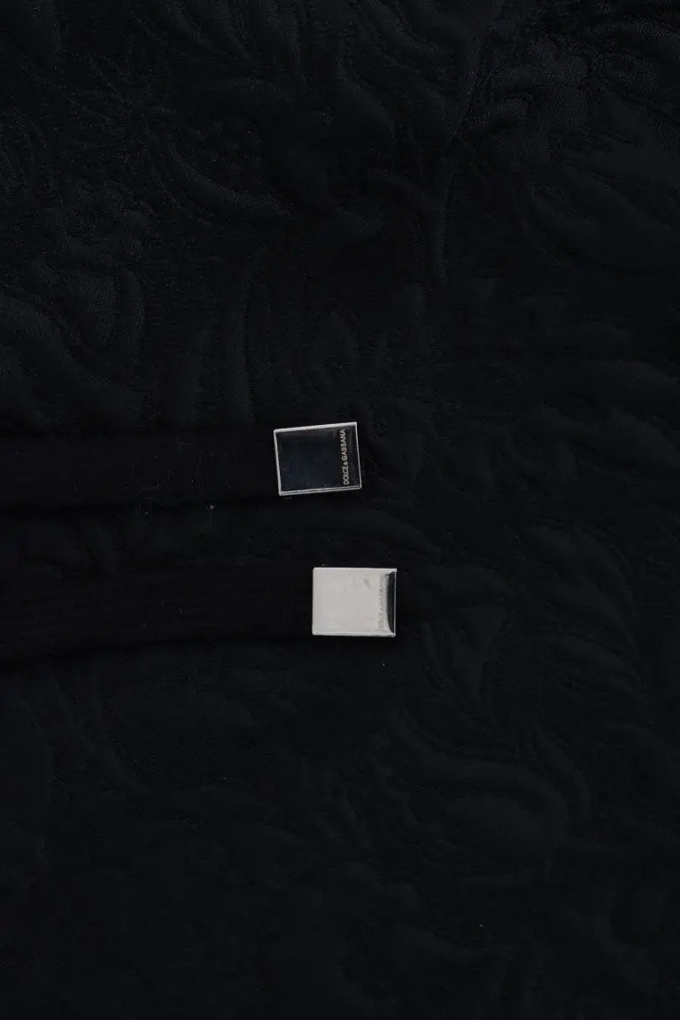 Boucle rectangulaire argentée avec dolce & gabbana gravé sur un sweat à capuche cristal noir fairytale de dolce & gabbana