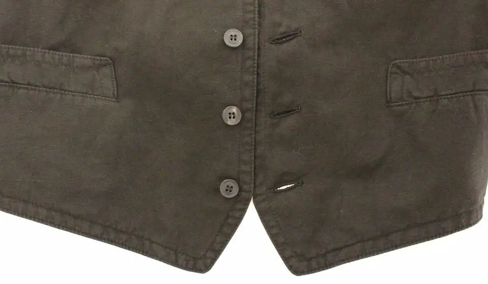 Dolce & Gabbana veste en coton noir olive foncé avec trois boutons assortis et deux poches à rabat