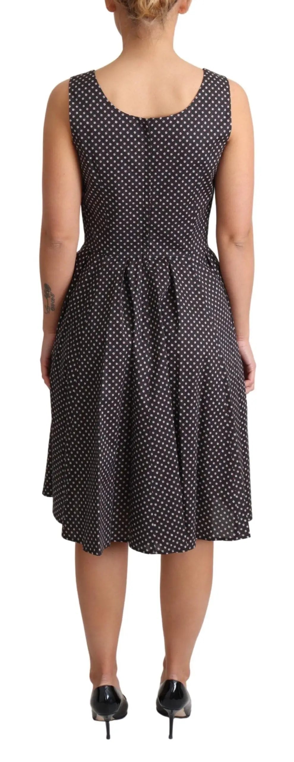 Robe a-line en coton noir à pois blancs dolce & gabbana avec corsage ajusté et jupe évasée