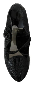 Dolce & gabbana black patent leather mary jane heels with floral embossed detailing and decorative buckle