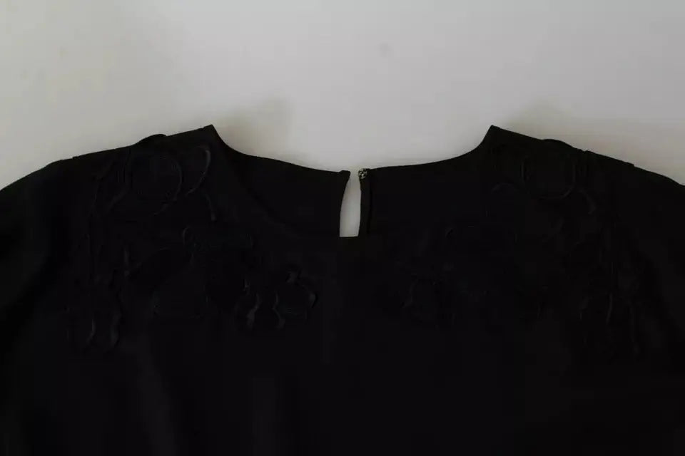 Blouse en soie dolce & gabbana noire avec dentelle florale subtile et fermeture éclair centrale au col