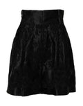 Mini jupe en satin noir dolce & gabbana avec broderie florale subtile et taille haute en soie