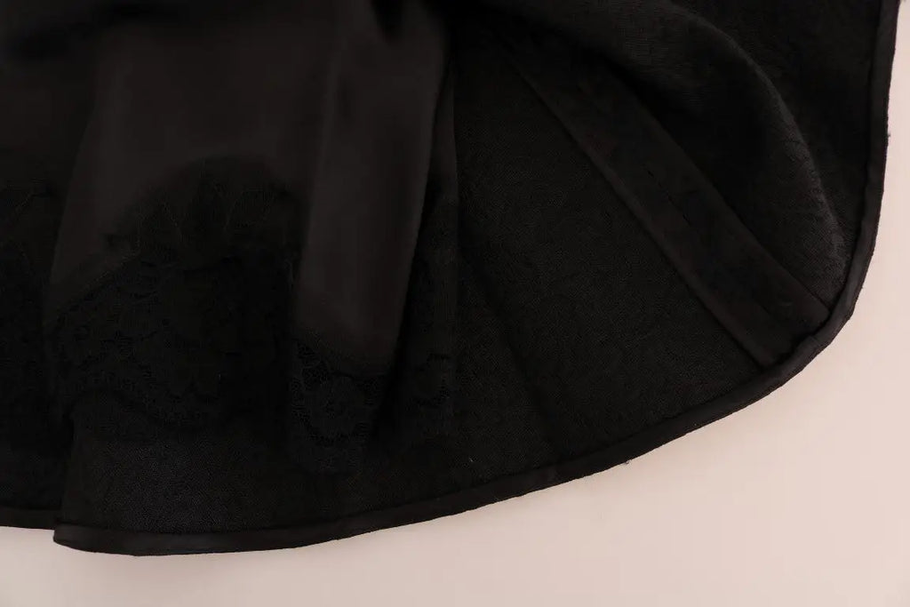 Jupe noire en satin dolce gabbana avec ourlet à volants et détails en dentelle en jacquard floral en soie