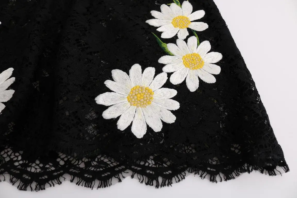 Jupe noire en dentelle dolce & gabbana avec broderie délicate de marguerites blanches au centre jaune