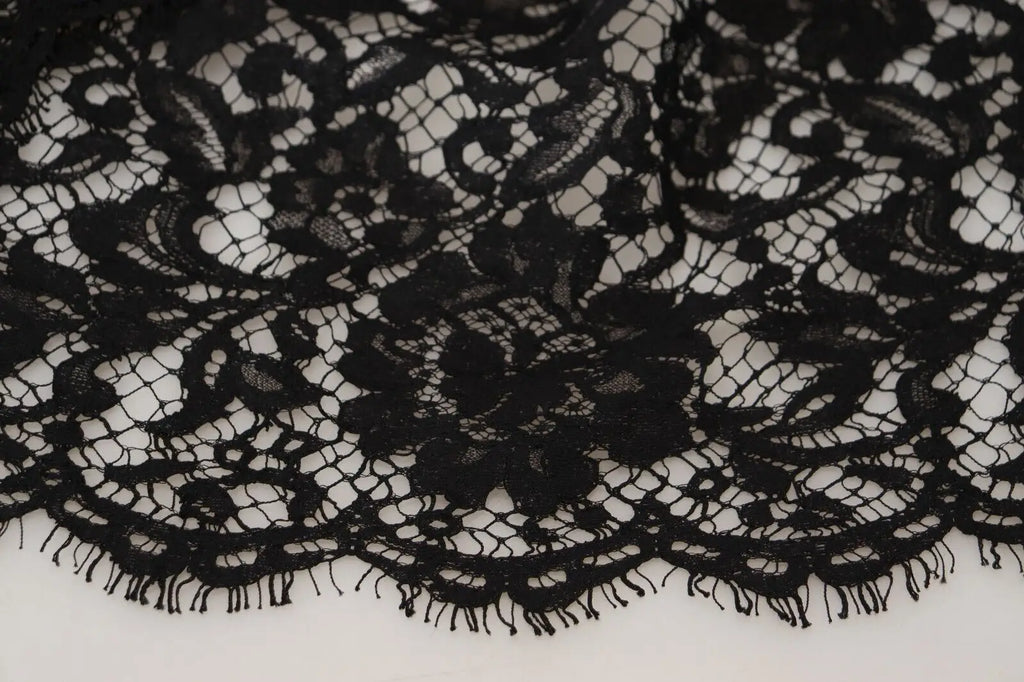 Tissu en dentelle florale noire délicate avec motifs complexes et bord festonné pour la robe courte en coton dolce & gabbana