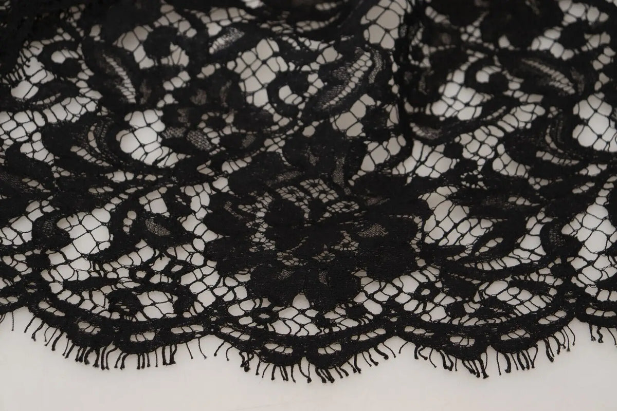 Tissu en dentelle florale noire délicate avec motifs complexes et bord festonné pour la robe courte en coton dolce & gabbana