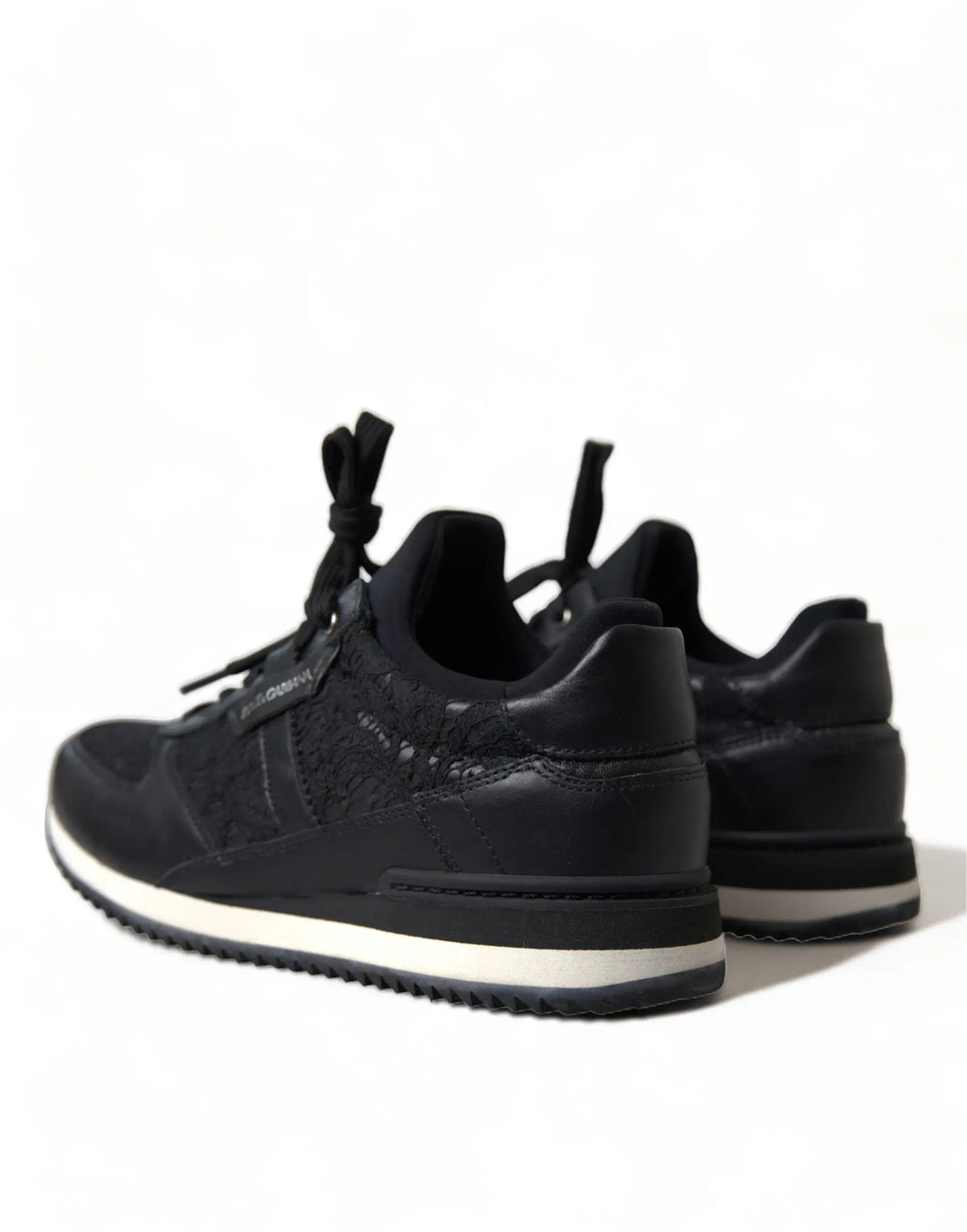 Dolce & Gabbana sneakers en cuir noir avec motif texturé floral et semelles en caoutchouc blanc