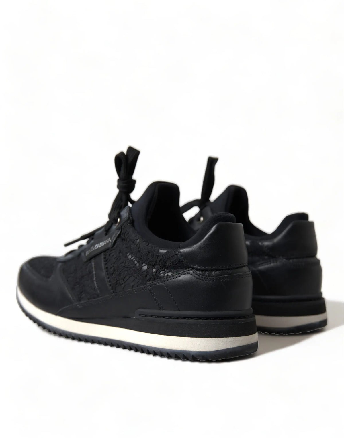 Dolce & Gabbana sneakers en cuir noir avec motif texturé floral et semelles en caoutchouc blanc