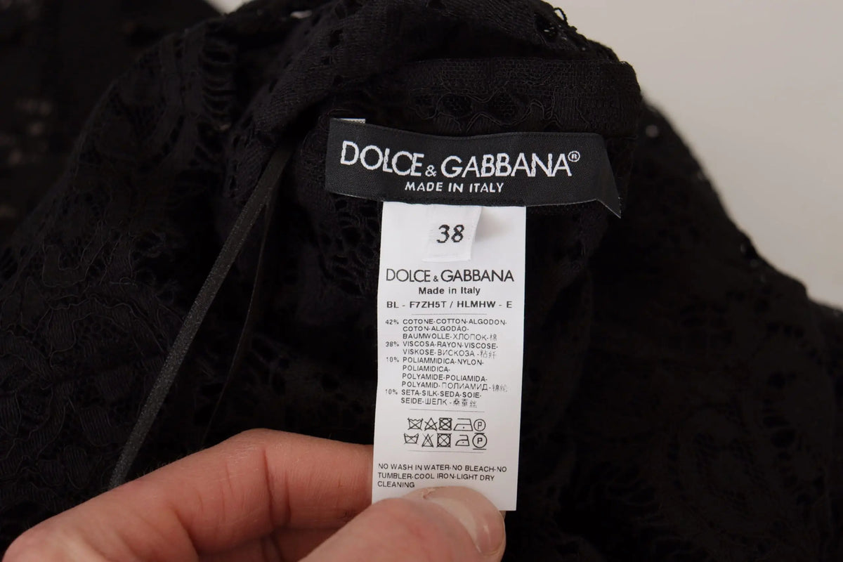 Étiquette noire en dentelle dolce & gabbana avec label blanc made in italy sur blouse sicily en dentelle florale noire