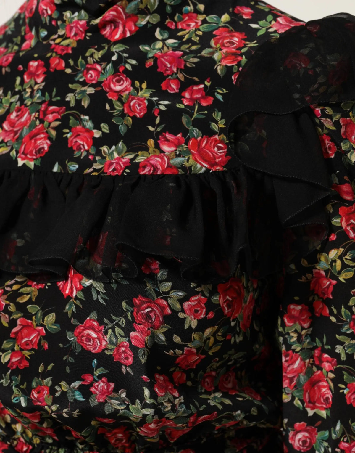 Blouse noire dolce gabbana à manches longues avec imprimé floral rouge vif et manches à volants superposés