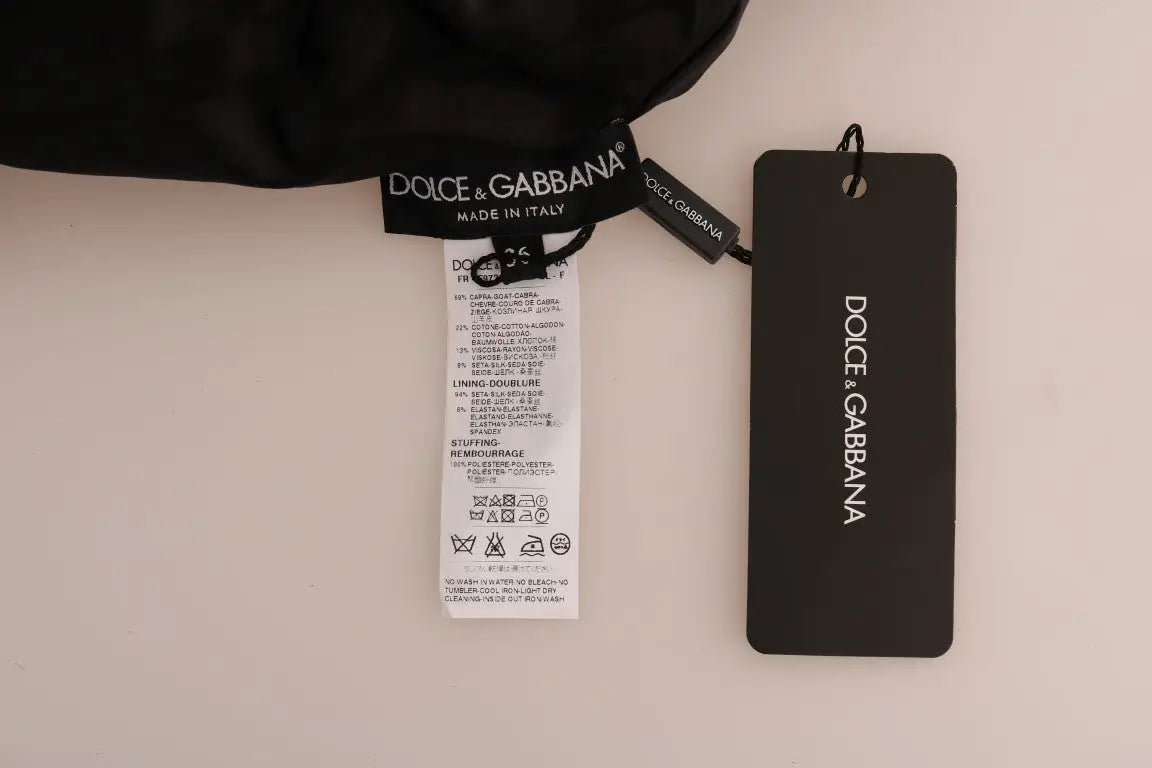 Étiquette noire dolce & gabbana avec texte blanc et instructions d’entretien pour pull zippé en brocart floral en fourrure noire