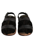 Sandales plates dolce & gabbana noires en cuir gazelle avec intérieur en fourrure et brides perforées décoratives