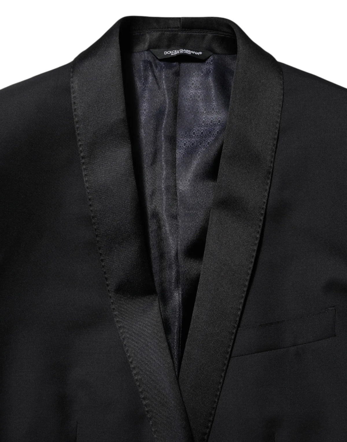 Veste de costume dolce & gabbana noire pour homme avec un bouton or, revers en satin et doublure discrètement imprimée