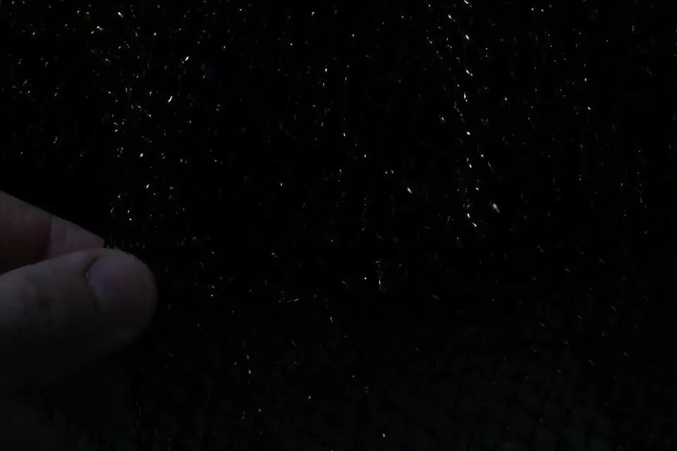 Tissu texturé noir avec des éclats scintillants subtils pour robe dolce & gabbana black gold crystal heart ligne a