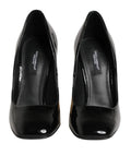 Dolce & gabbana escarpins noirs en cuir verni avec logo doré talons carrés et fini brillant élégant