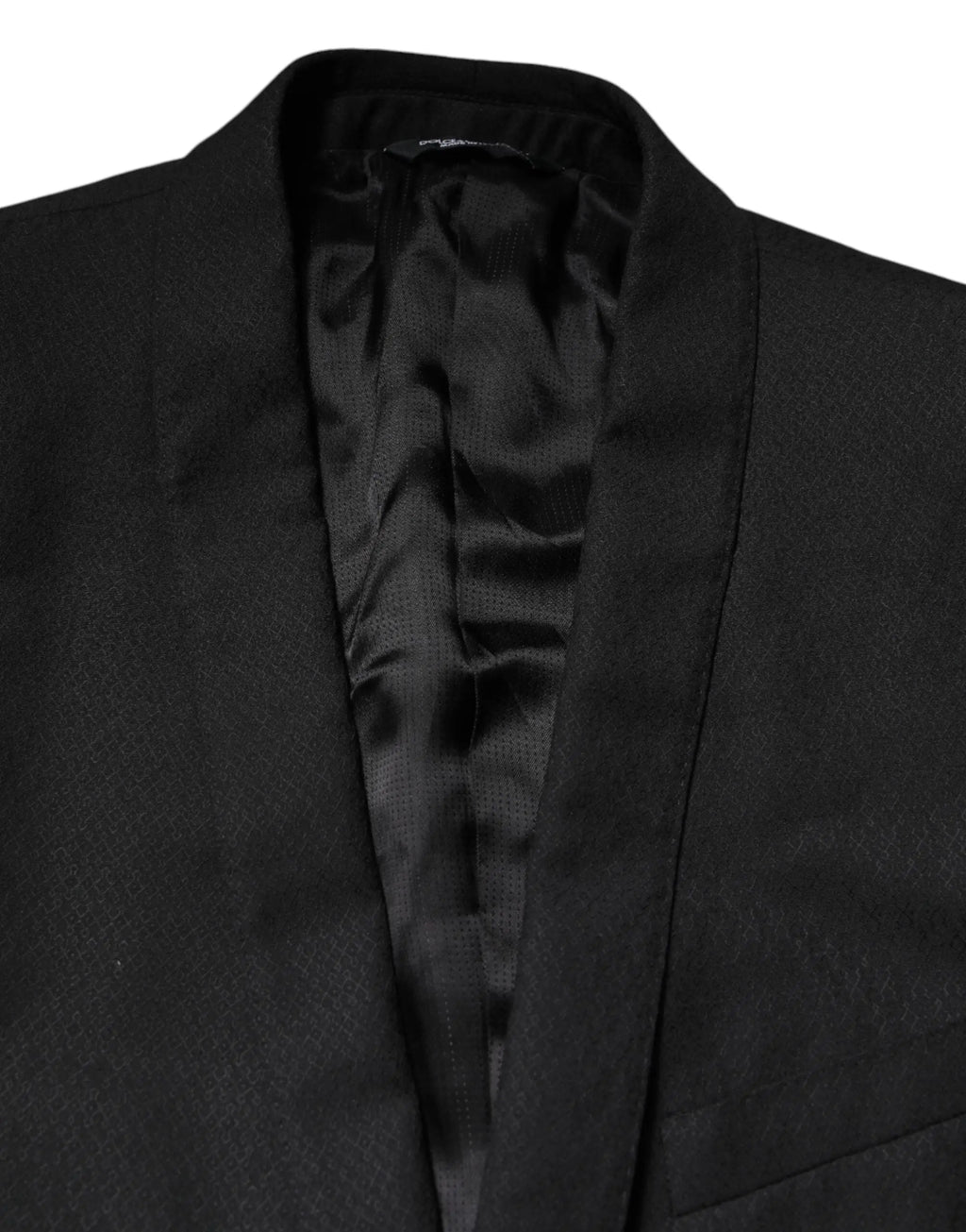 Dolce & Gabbana blazer noir en laine avec doublure satinée élégante et coupe simple boutonnage pour costume