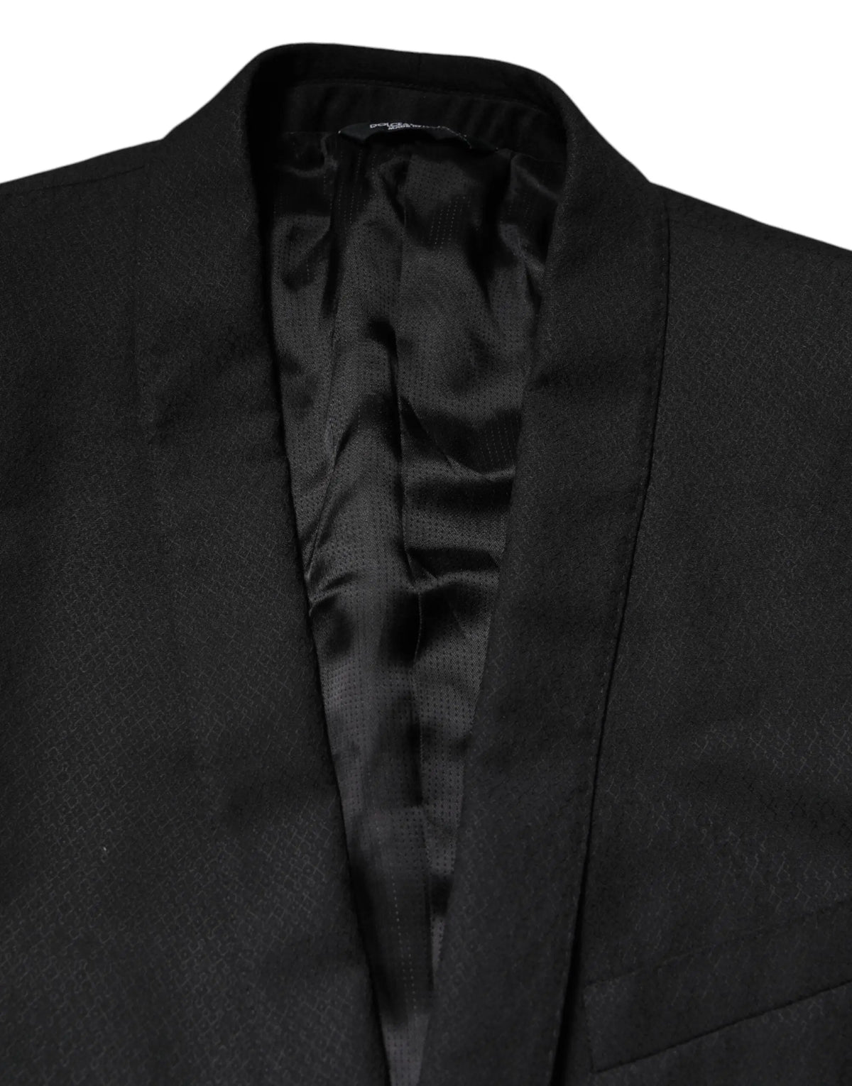 Dolce & Gabbana blazer noir en laine avec doublure satinée élégante et coupe simple boutonnage pour costume