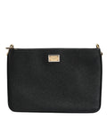 Dolce & gabbana clutch en cuir grainé noir avec plaque logo rectangulaire et détails métalliques dorés