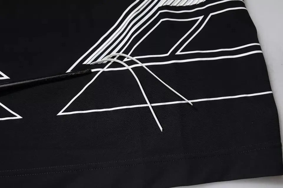 T-shirt dolce & gabbana noir en nylon avec imprimé graphique blanc et lignes géométriques audacieuses