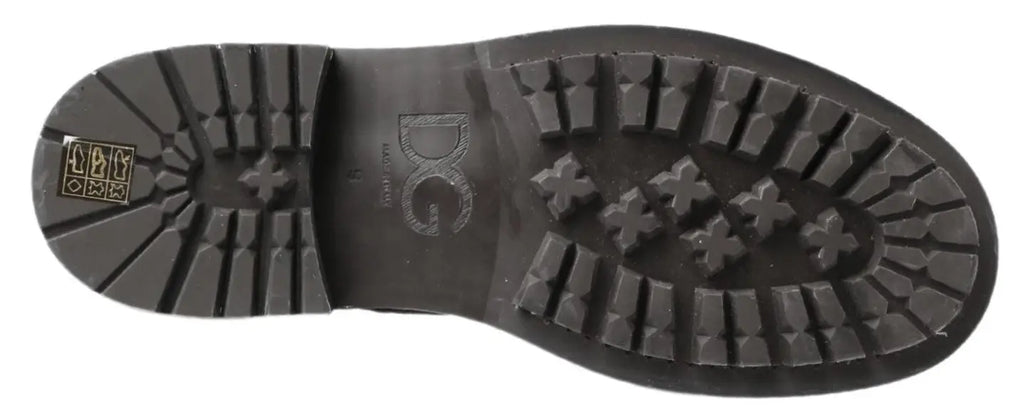 Semelle noire en caoutchouc avec motif profond et logo dg embossé sur bottes mi-mollet en cuir dolce & gabbana noir gris