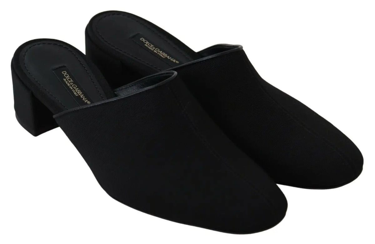 Mules noires en suède dolce & gabbana avec talon bloc bas et logo sur la semelle intérieure