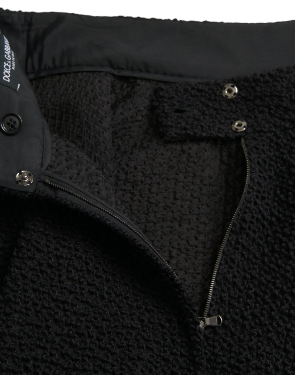 Dolce & Gabbana pantalon noir en laine mélangée avec fermeture éclair et boutons pression avec label de la marque