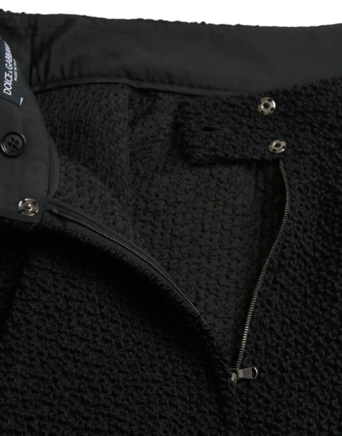 Dolce & Gabbana pantalon noir en laine mélangée avec fermeture éclair et boutons pression avec label de la marque