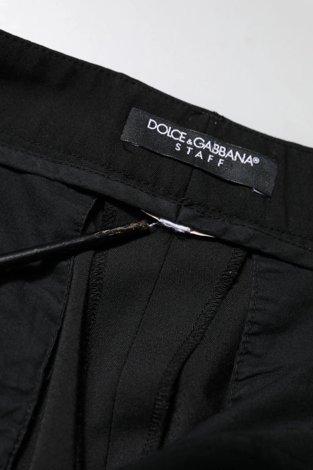 Pantalon tapered staff dolce & gabbana noir taille haute avec design ajusté et plis subtils en tissu élégant