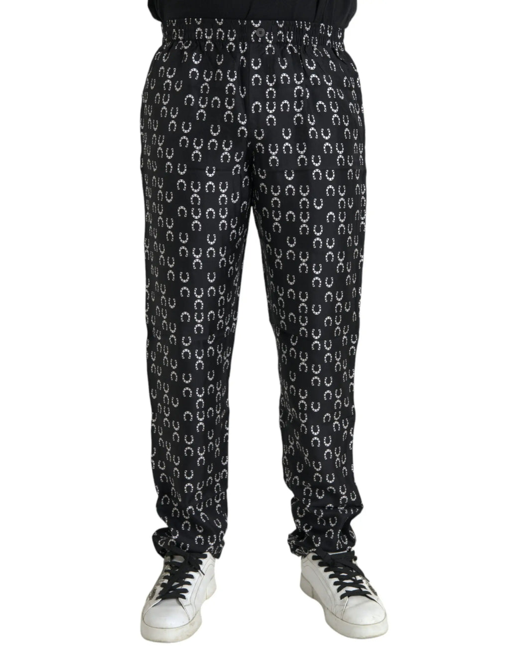 Dolce & Gabbana pantalon en soie noir avec imprimé blanc de fers à cheval répété sur le tissu
