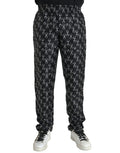 Dolce & Gabbana pantalon en soie noir avec imprimé blanc de fers à cheval répété sur le tissu