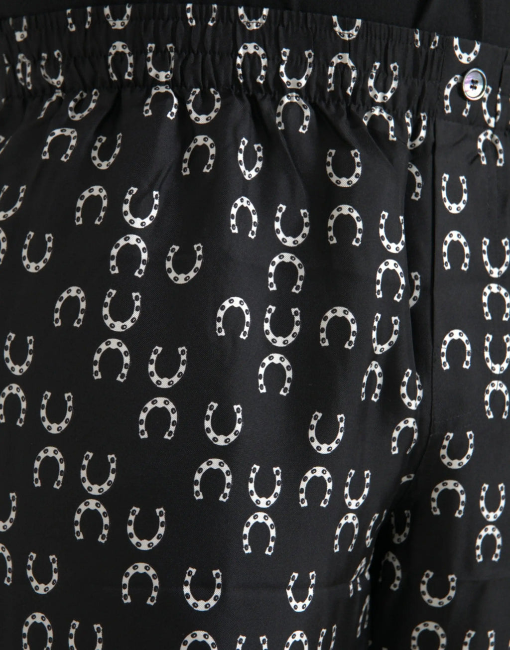 Pantalon en soie noir dolce & gabbana avec imprimé récurrent de fers à cheval blancs et petits points