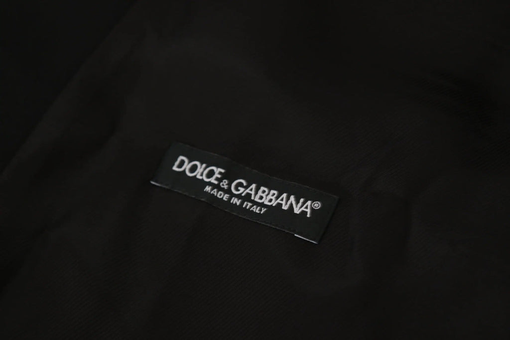 Étiquette noire dolce & gabbana avec texte brodé blanc dolce&gabbana made in italy sur veste blazer martini noire