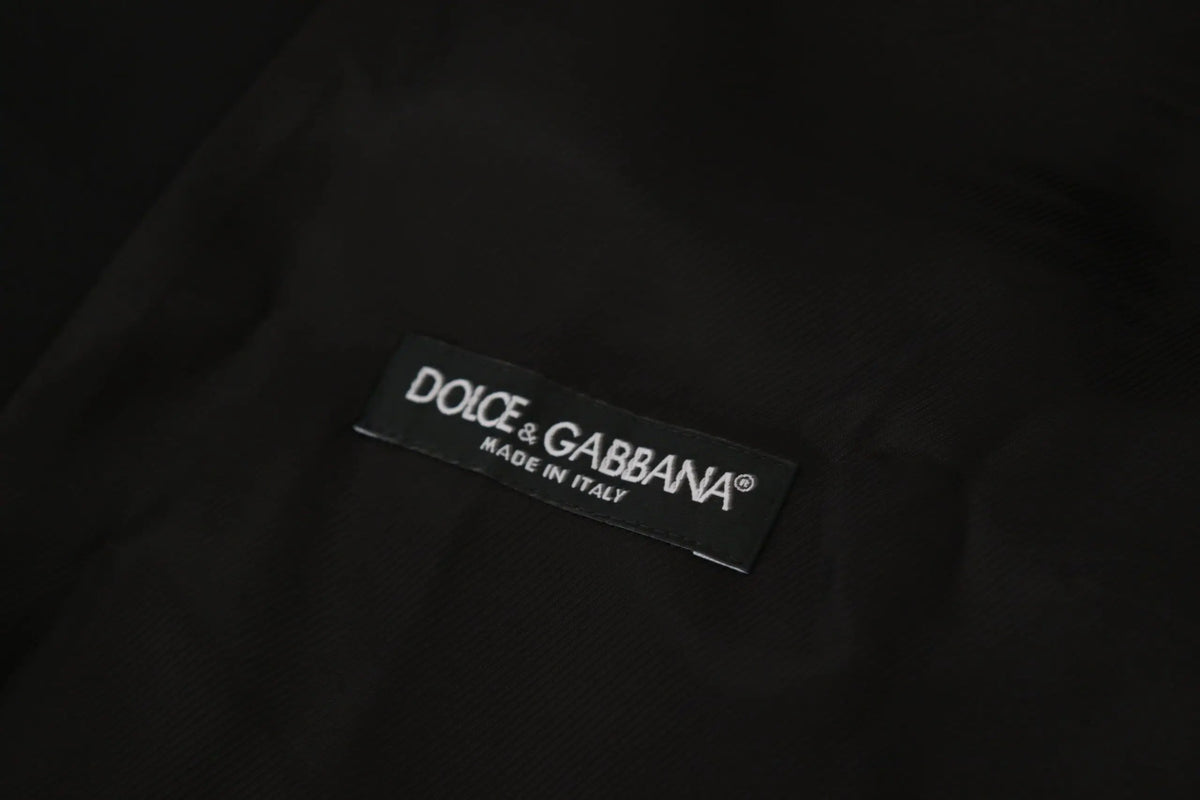 Étiquette noire dolce & gabbana avec texte brodé blanc dolce&gabbana made in italy sur veste blazer martini noire