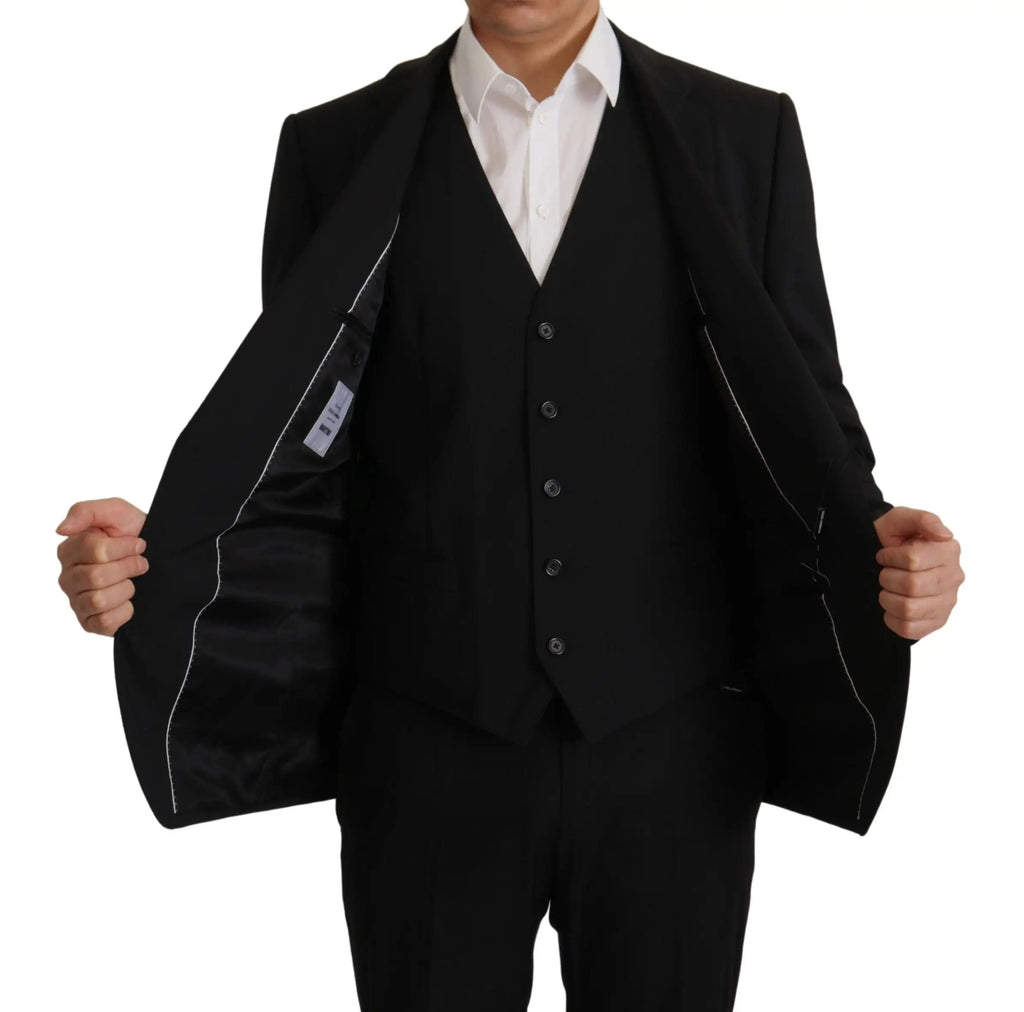 Dolce & gabbana black three-piece suit with sleek tailored fit and subtle white stitching along inner seams