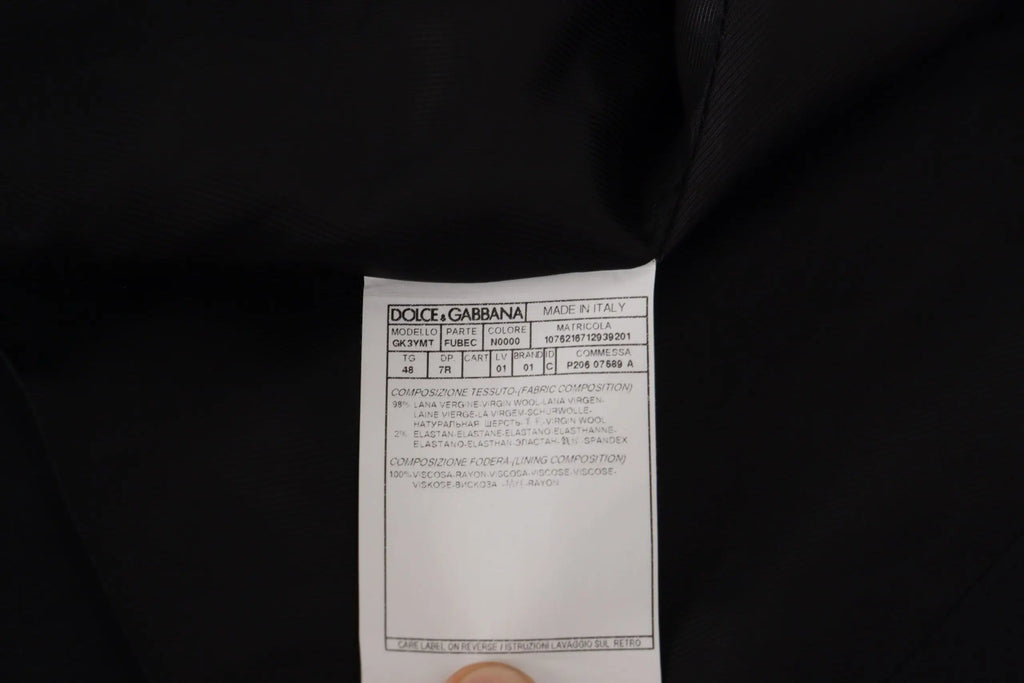 Étiquette noire dolce & gabbana avec texte blanc et composition détaillée du tissu pour veste blazer martini 2 pièces
