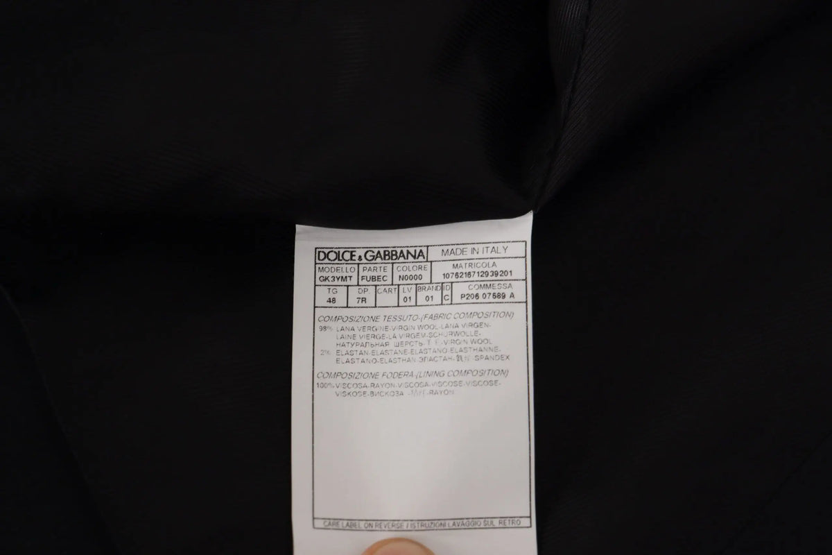 Étiquette noire dolce & gabbana avec texte blanc et composition détaillée du tissu pour veste blazer martini 2 pièces