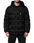 Veste matelassée noire dolce gabbana en jacquard avec capuche et motif logo embossé subtil