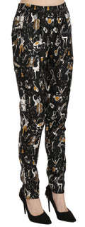 Pantalon dolce & gabbana noir taille haute imprimé jazz club avec motifs instruments de musique blancs et dorés