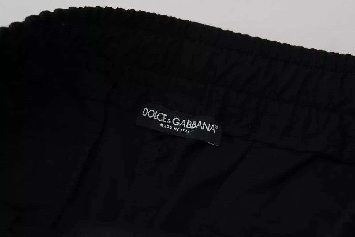 Étiquette noire dolce & gabbana made in italy cousue dans la ceinture élastique du jogging en laine noir