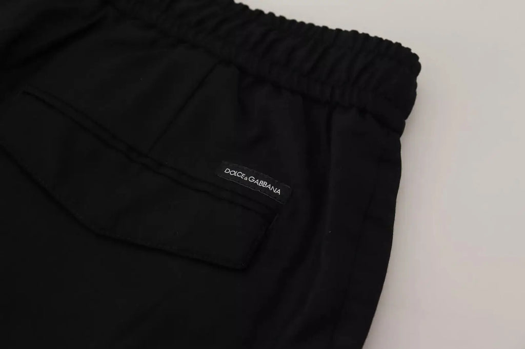 Pantalon de jogging dolce & gabbana noir en laine avec taille élastique et étiquette de marque sur la poche