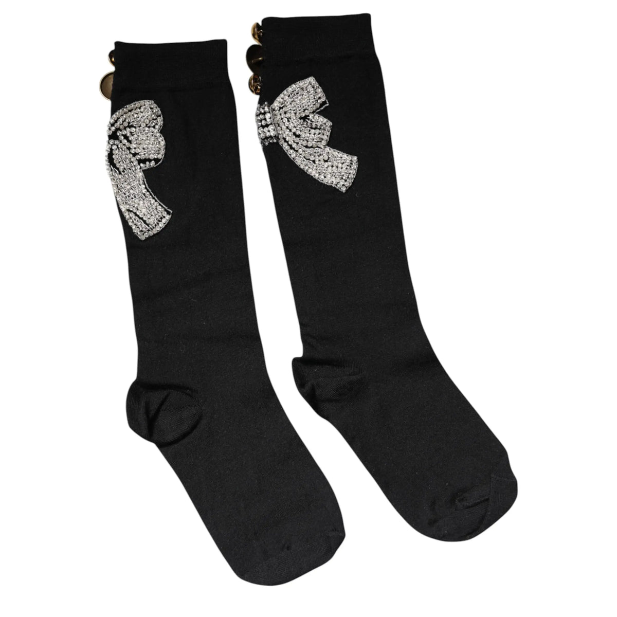 Dolce & gabbana chaussettes noires en maille avec nœud en cristal argenté et boutons dorés sur la jambe supérieure