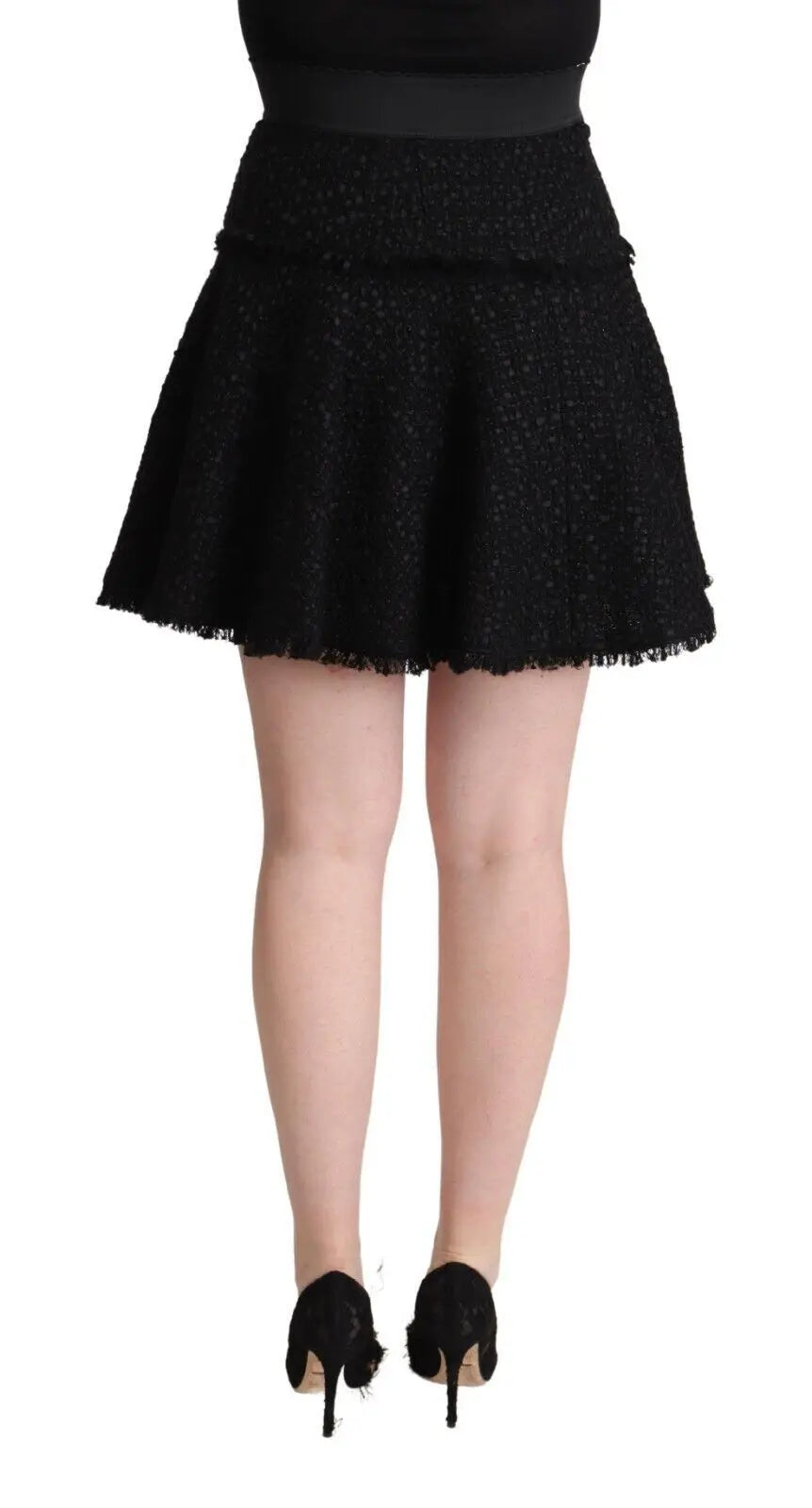 Dolce & Gabbana jupe mini trapèze en nylon noir tricoté avec texture tweed et ourlet effiloché