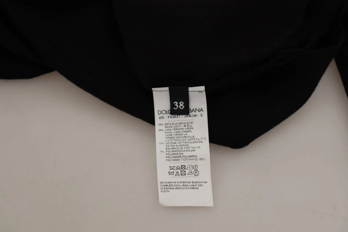 Étiquette blanche rectangulaire dolce & gabbana avec texte noir taille 38 pour cardigan noir dentelle angel roses