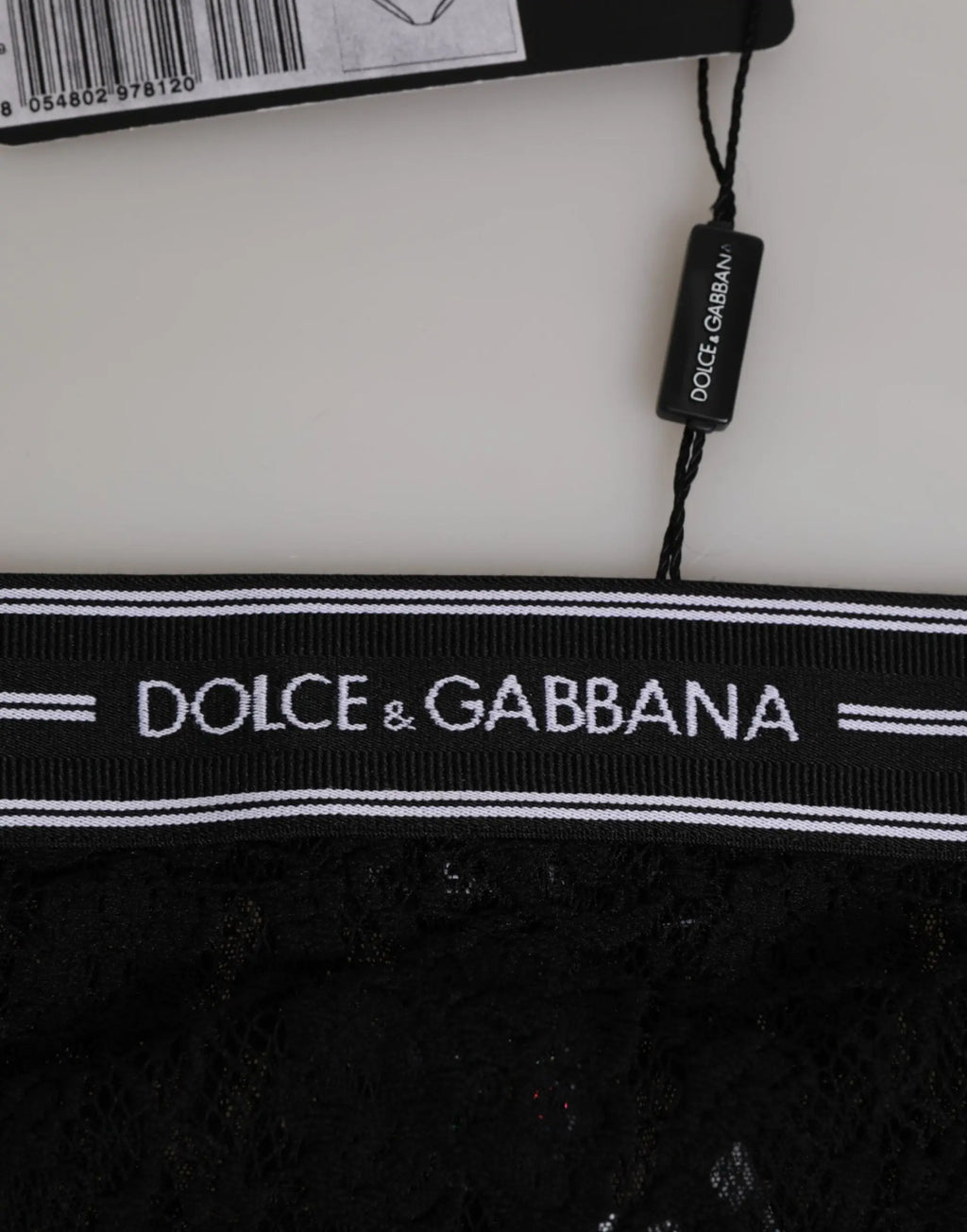 Slip brief noir en dentelle dolce & gabbana avec ceinture côtelée et logo blanc pour un style élégant