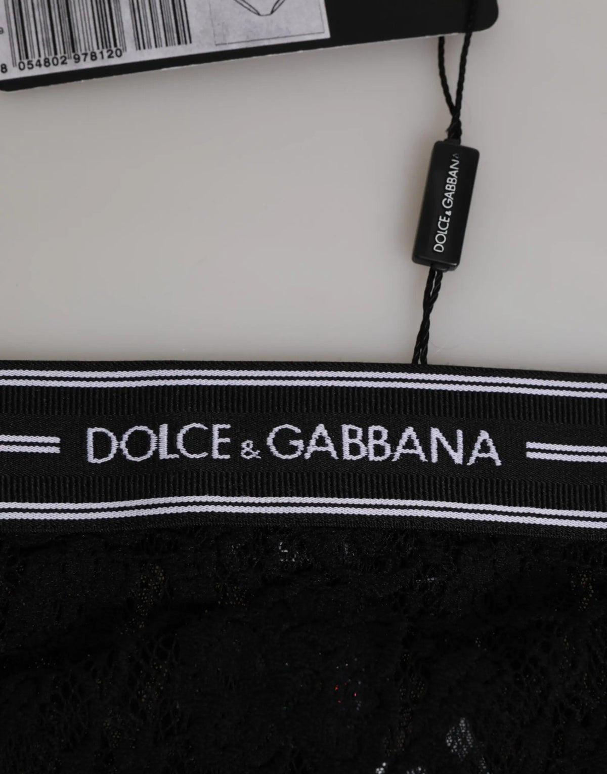 Slip brief noir en dentelle dolce & gabbana avec ceinture côtelée et logo blanc pour un style élégant