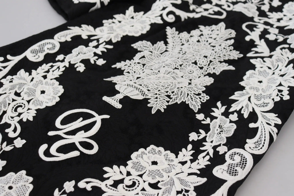 Robe dolce & gabbana noire en dentelle à manches mi-longues avec broderie florale blanche et monogramme stylisé