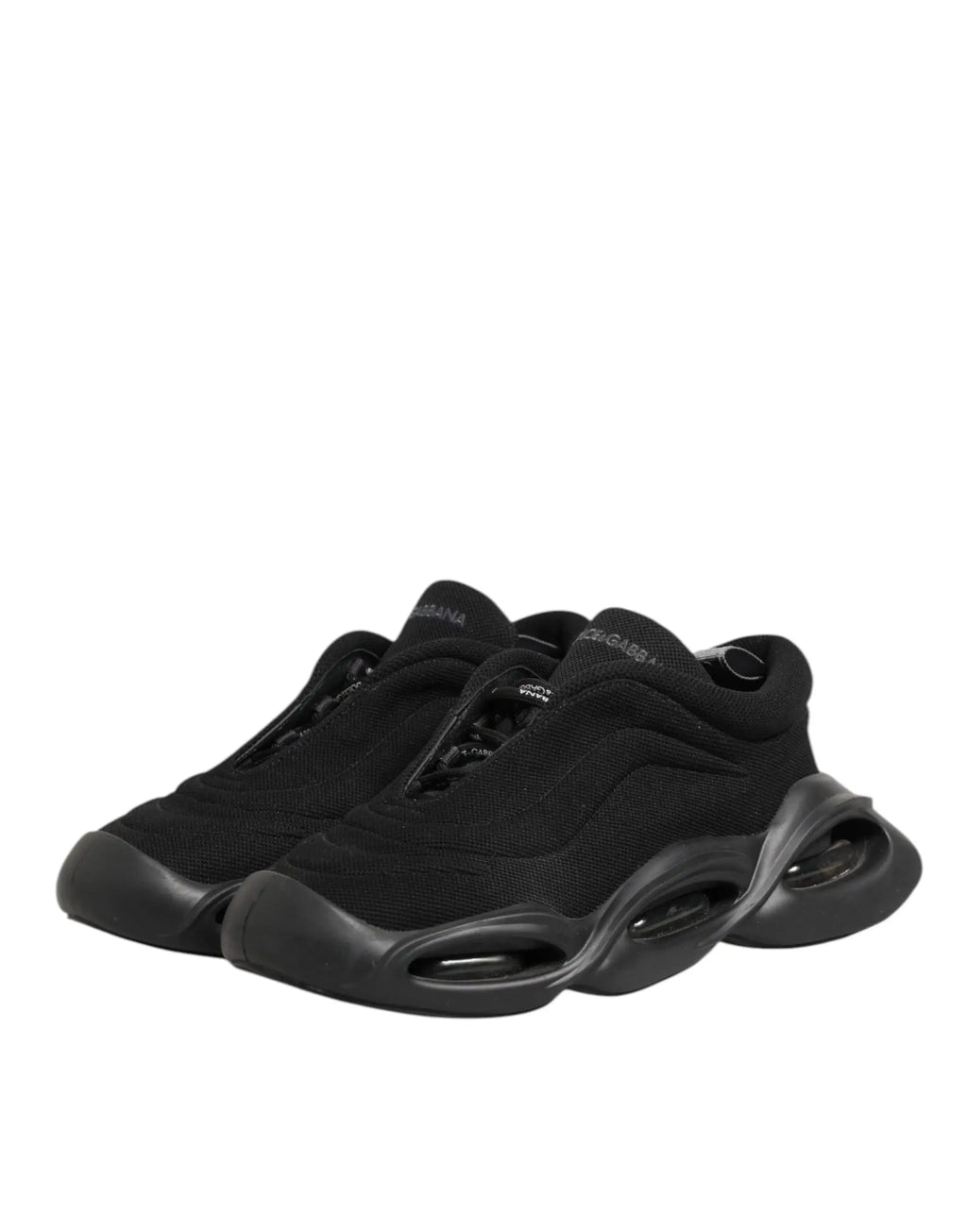Baskets basses dolce & gabbana noires pour hommes avec tige en mesh et semelle en caoutchouc sculptée balenciaga triple s