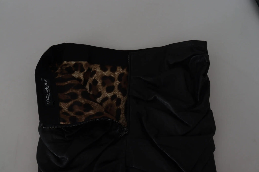 Jupe mini en cuir d’agneau noire dolce gabbana avec doublure imprimé léopard visible