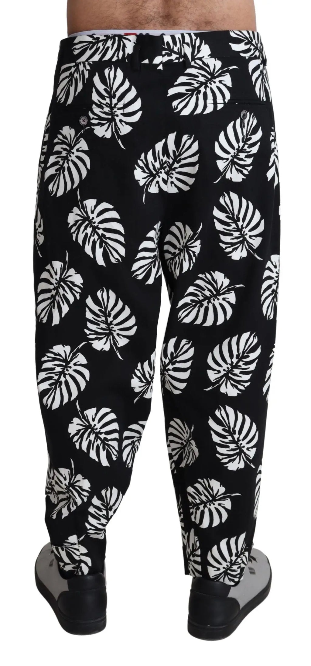 Pantalon dolce & gabbana noir en coton stretch avec motif feuilles de monstera blanches audacieuses