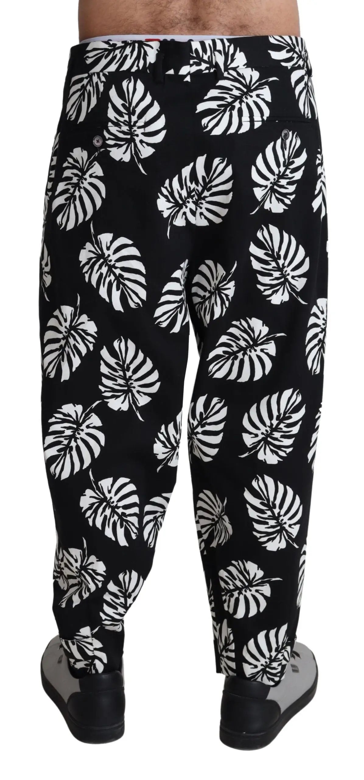 Pantalon dolce & gabbana noir en coton stretch avec motif feuilles de monstera blanches audacieuses